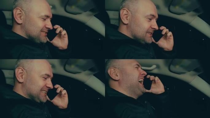 Smilling中年男子晚上在汽车上用手机进行情感对话