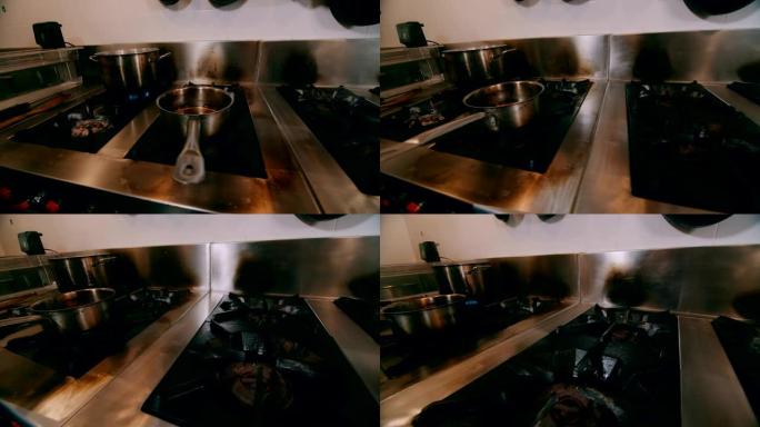 商用厨房炉灶的快速移动镜头。
