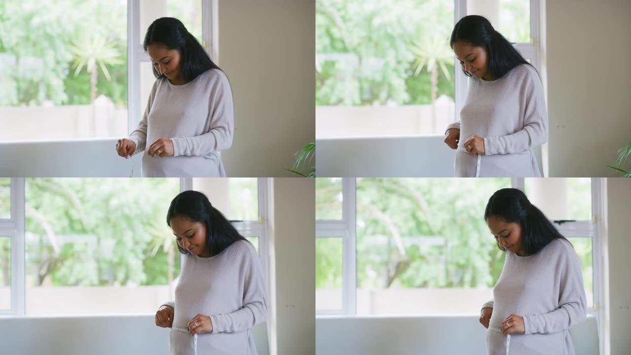 一名孕妇测量腹部的4k视频片段