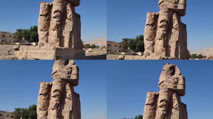 位于埃及古底比斯卢克索的卢克索神庙。梅农的巨像，法老阿蒙霍特普三世的两座石质雕像，他在第十八王朝统治