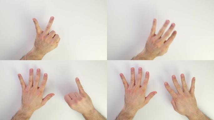 手指从一到十。在白人白人手上显示分数。显示规则或子句的编号。男性的手显示一根手指。从拳头到张开的手掌