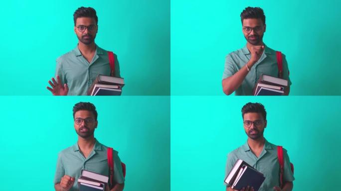 印度学生男子看着相机感到高兴，戴着眼镜和橙色背包，在蓝色工作室里谈论认知书籍