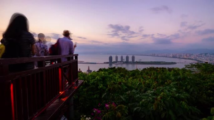日落三亚公园拥挤视点著名酒店全景4k延时海南岛中国