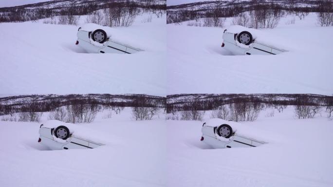 降雪后，汽车在深雪中的山上发生事故后翻车，后视图，汽车行驶结冰的湿滑山路，平移视频