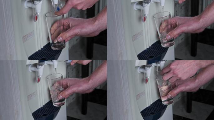 水冷却器，清水从饮水机倒入玻璃中