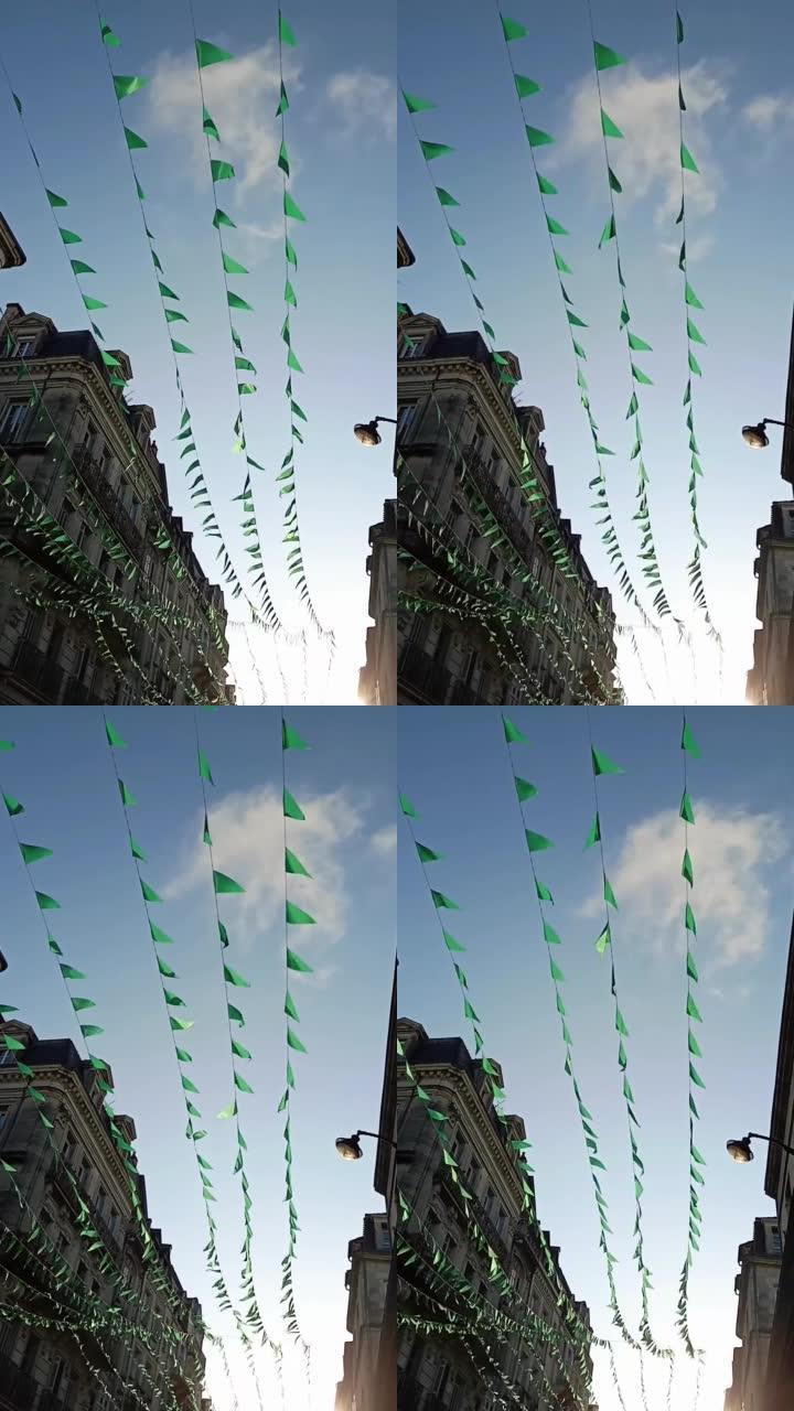绿色锦旗在空中以轻松的方式飞舞的视频