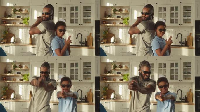 开朗的非洲父亲和学龄男孩用手指枪手势射击
