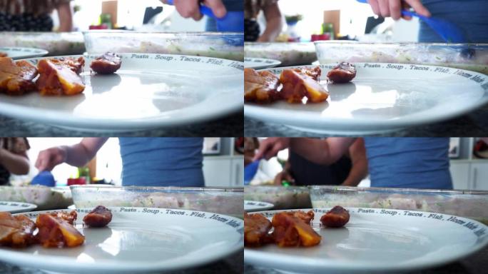 一天中，几个朋友在4k的海滨别墅里煮酸橘汁腌鱼的盘子与红薯的特写镜头