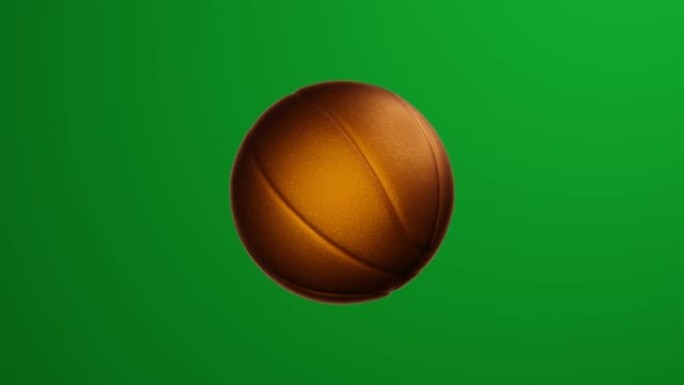 金色篮球球在绿屏背景上旋转。