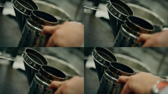 厨房里的餐厅厨师使用小炉子