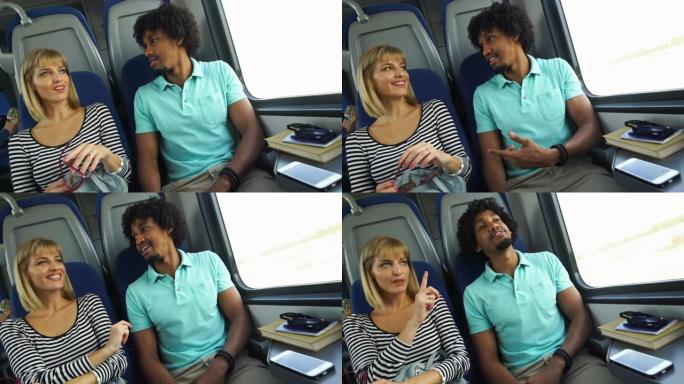 年轻夫妇坐火车。年轻夫妇坐火车外国人笑脸