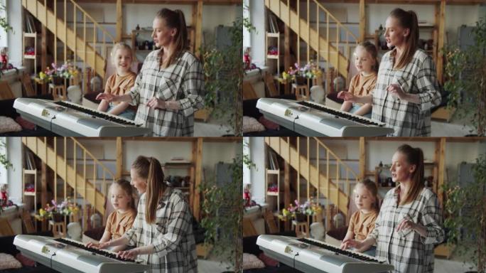 老师教孩子从音符中唱歌。她喜欢钢琴