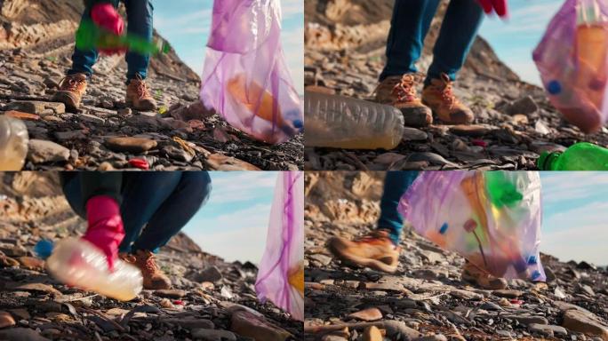 一名志愿者把一个塑料脏瓶子放在垃圾袋里。低角度视图。戴着防护手套的手的特写镜头。清理海洋和地球日的概