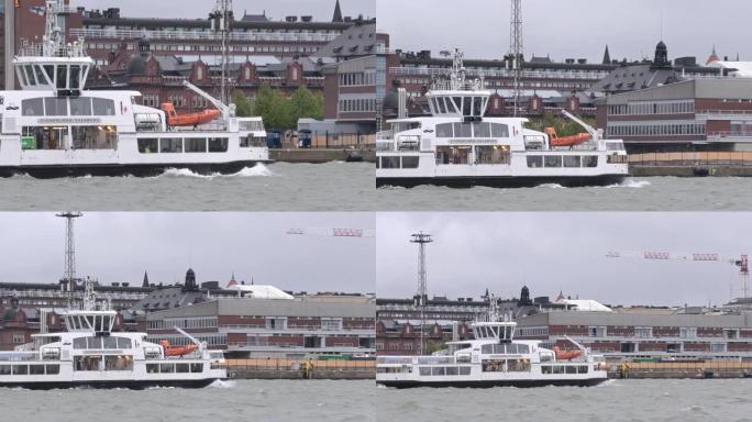 一艘芬兰船只在赫尔辛基港口的暴风雨中航行的惊人照片。