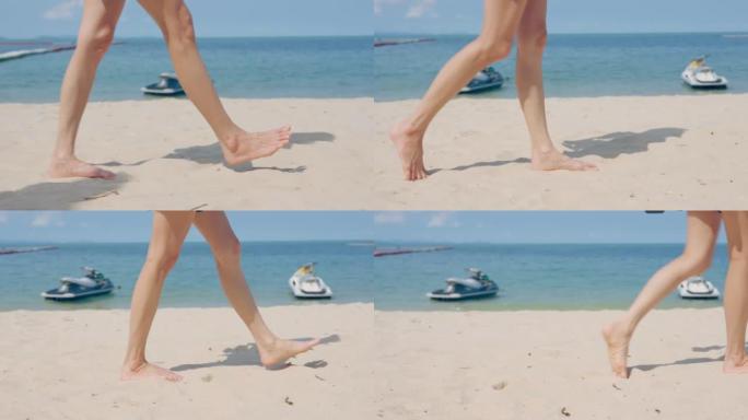 亚洲美丽的年轻女子旅行者赤脚在平静温暖的海浪中行走的特写镜头。迷人的快乐女孩在海滩上迈出一步时感到放