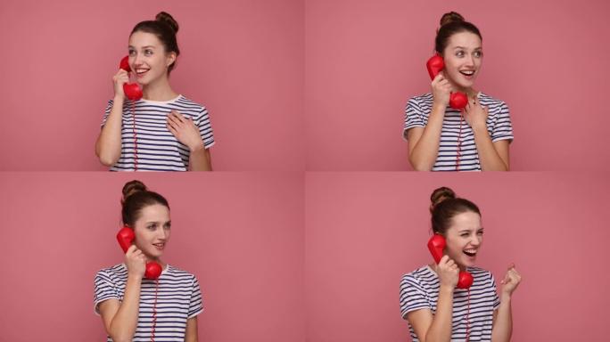 女人拿着红色的手机通话固定电话，保持愉快的交谈，微笑。