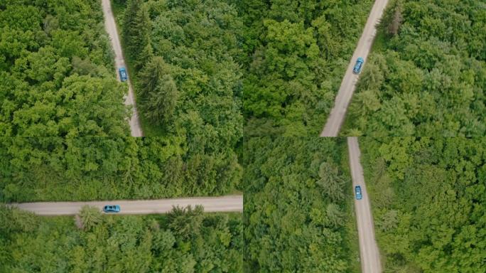 蓝色汽车在夏天在路上行驶。沿着森林中的道路驾驶现代汽车。电动汽车对自然没有任何伤害。空中轨道视图。