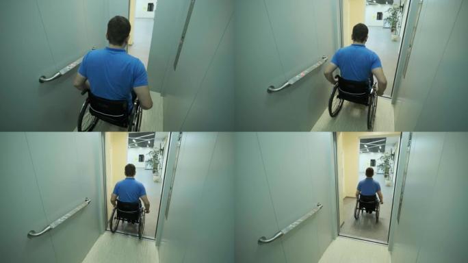 一个坐轮椅的残疾人进了电梯。残疾人乘电梯。