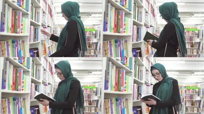 在图书馆或书店里戴着头巾的女孩在看书