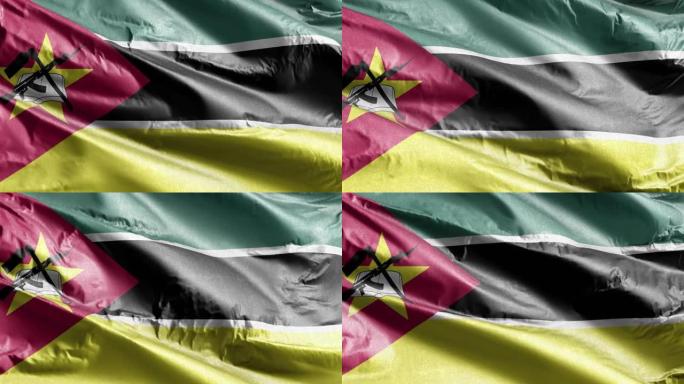 莫桑比克纺织旗帜在风中飘扬。莫桑比克的旗帜在微风中摇曳。面料纺织组织。完全填充背景。10秒循环。