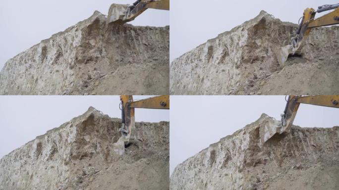 挖掘机正在开采。挖掘机提取石灰石