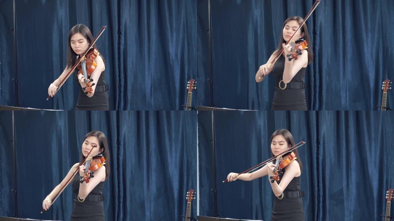 亚洲少女音乐家演奏小提琴独奏在线教学流。