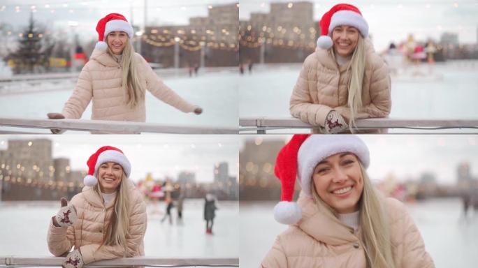 冬天。圣诞节假期，戴着圣诞老人帽子的女人在中央广场的开放城市溜冰场上滑冰。冬季。高加索成年女性业余滑