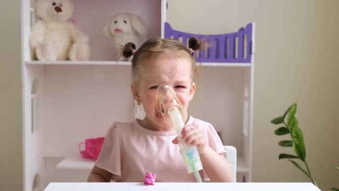孩子在治疗过程中抽泣。女孩不喜欢在吸入时吸入蒸汽。儿童上、下呼吸道疾病