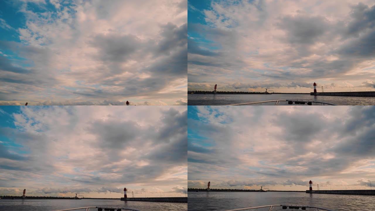 从海湾驶出的船上拍摄的镜头。日落时的酷炫镜头