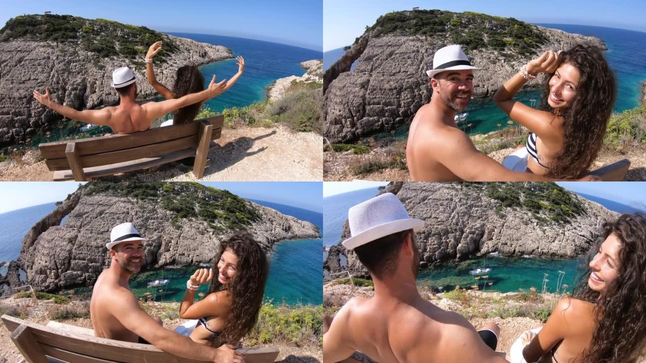 4k视频开朗的夫妇坐在希腊海边的长凳上