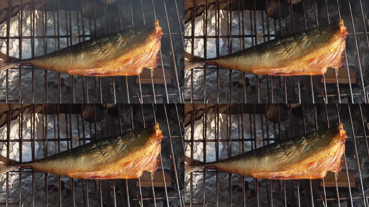 新鲜熏制的红焦鱼是从红烟屋的网格中取出的