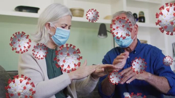 病毒细胞与高级高加索夫妇用口罩消毒手的动画