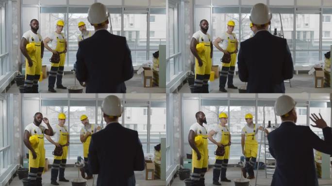 在hardhat中解释建筑商翻新工厂的商人承包商的后视图