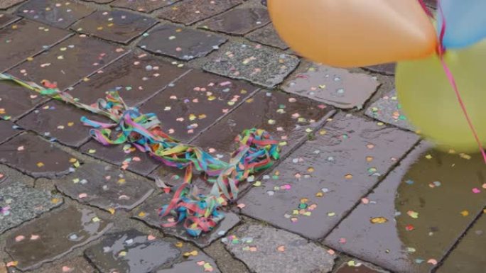 雨中的街头派对-五彩纸屑，彩带和气球
