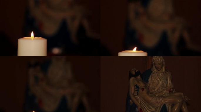2017年3月13日，雅加达: 背景上的烛光和Pieta雕塑的录像