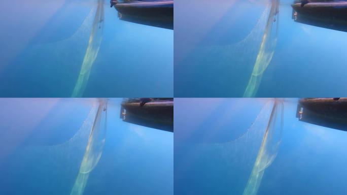 水下海下船上悬挂的渔网