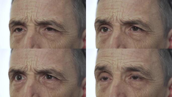 老人眼睛的情感肖像，特写，白色背景
