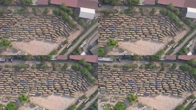 群甘蔗收割车停放排队送工业加工厂区农产品