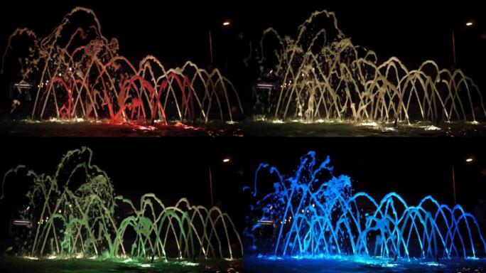 塞浦路斯帕福斯的城市喷泉喷水在夜间通过水下灯改变颜色