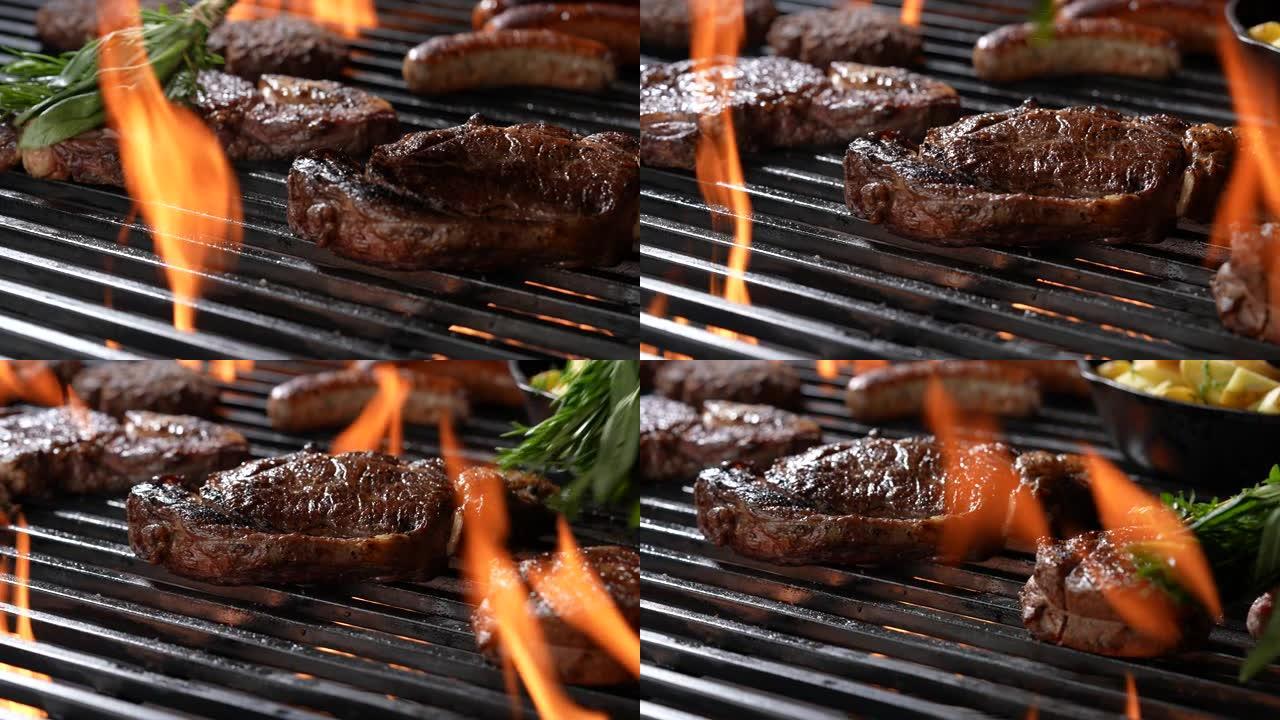 煮熟的多汁牛排牛肉，用迷迭香刷在燃烧的烤架上，周围是其他肉和香肠。慢动作