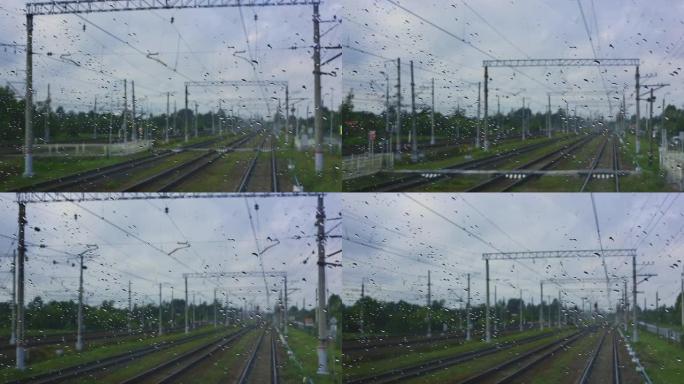 4k，从火车机车的湿前窗到铁路的视图