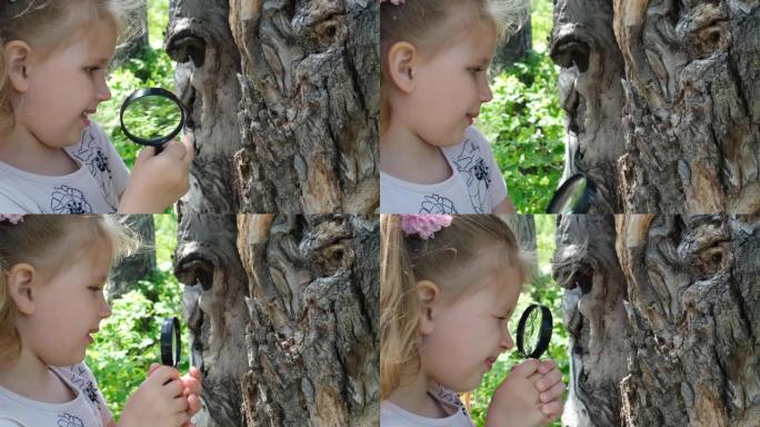 小女孩手里拿着放大镜观察大自然的细节。