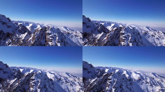 用无人机俯瞰哈萨克斯坦高耸的雪峰