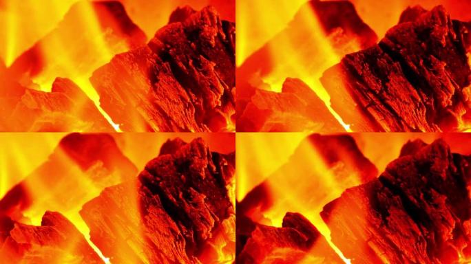 红色火焰和燃烧的木炭。