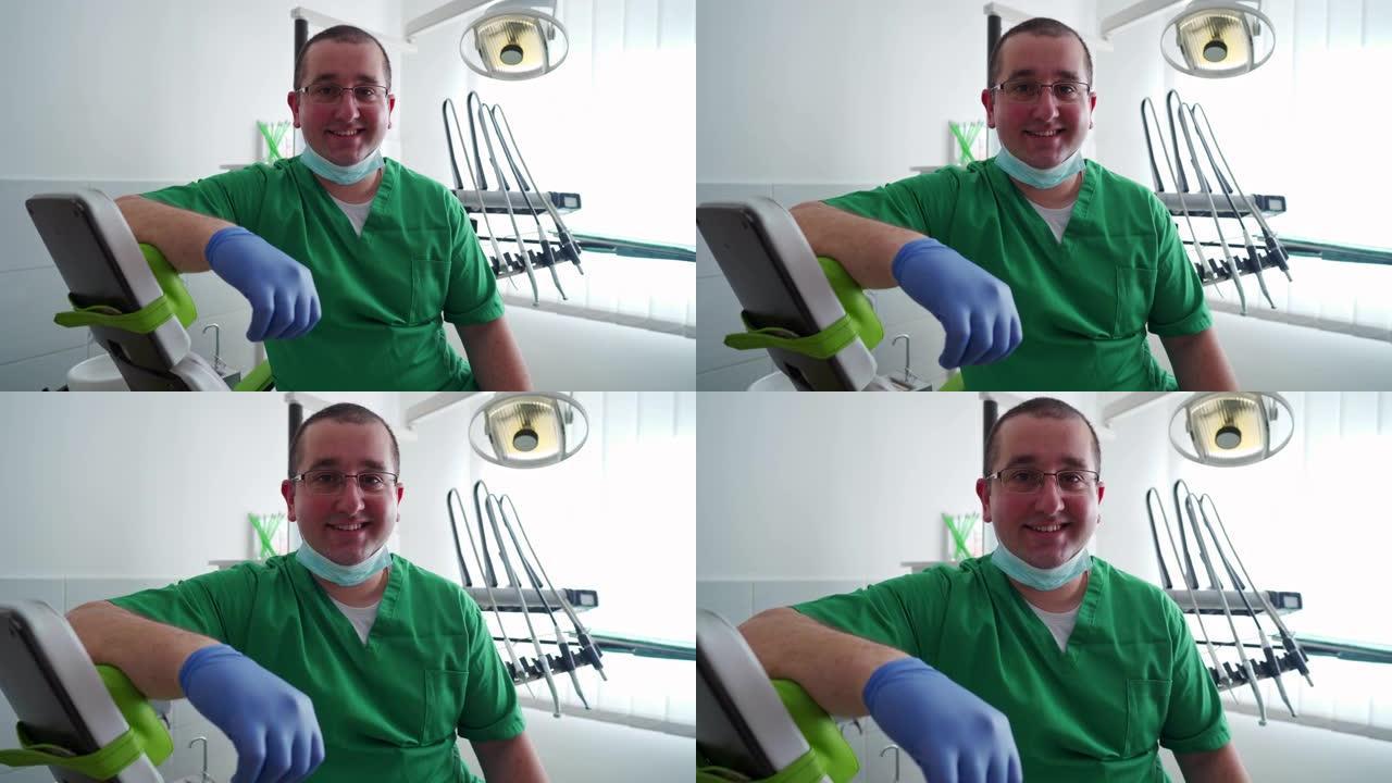 牙科诊所开朗的男性牙医的肖像
