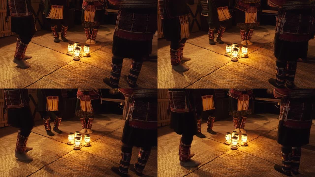 阿卡山部落表演艺术，传统服装围绕灯笼跳舞。