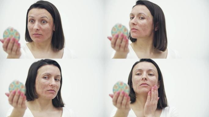4k慢动作特写女性面部皮肤问题照镜子的视频。