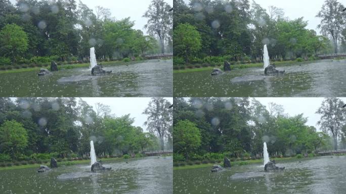 4K实拍，春雨中公园里的湖水与喷泉。
