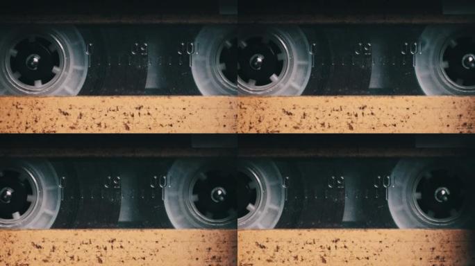老式黄色录音带在旧录音机的甲板上播放