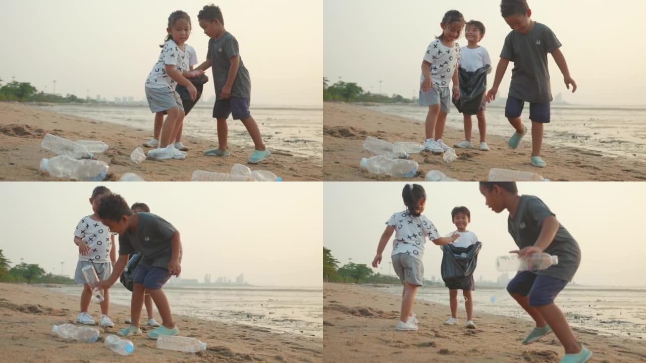 志愿者快乐家庭的孩子把塑料瓶放进黑色的垃圾塑料袋里清洁海滩